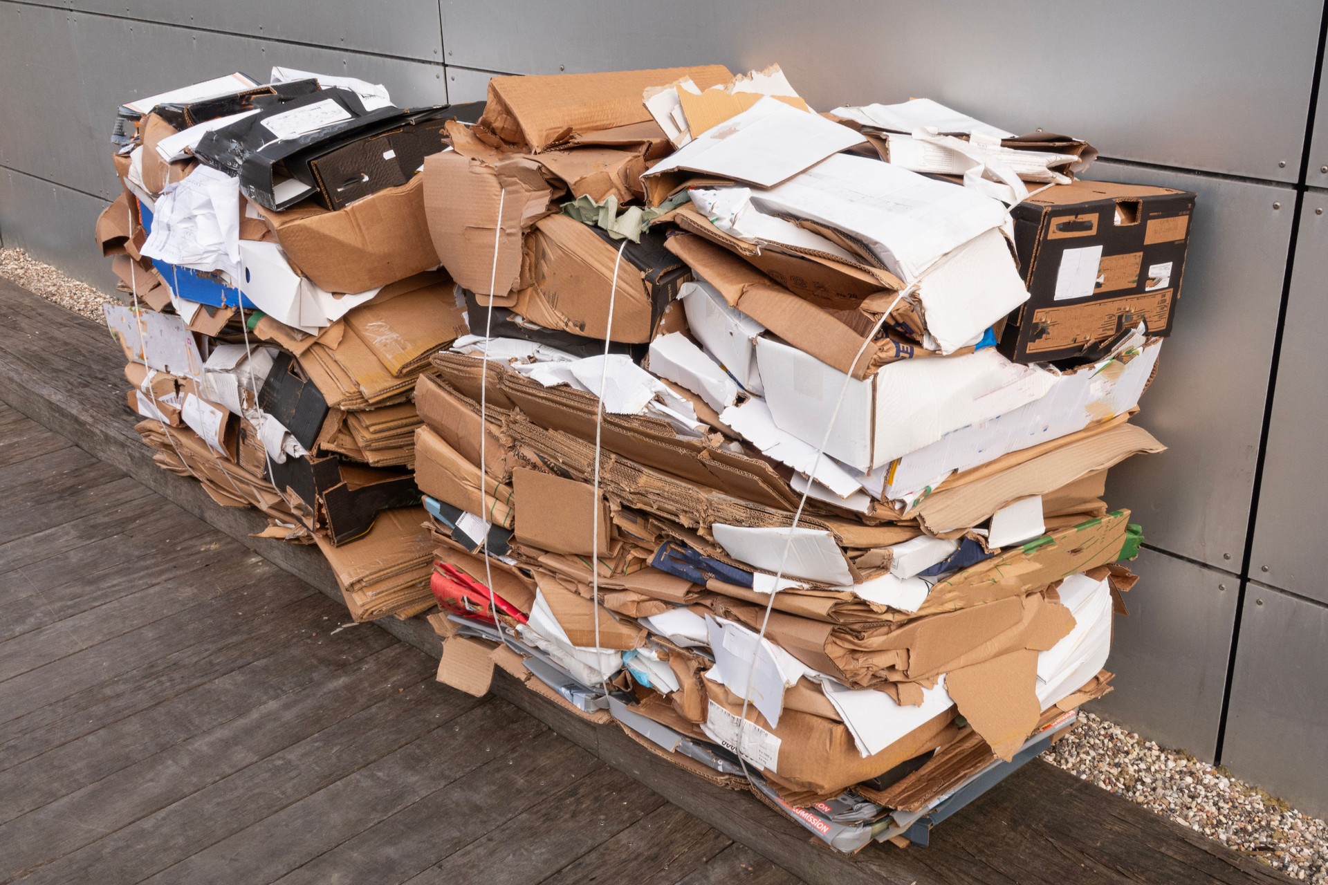 Cardboard waste tied together on a pallet.